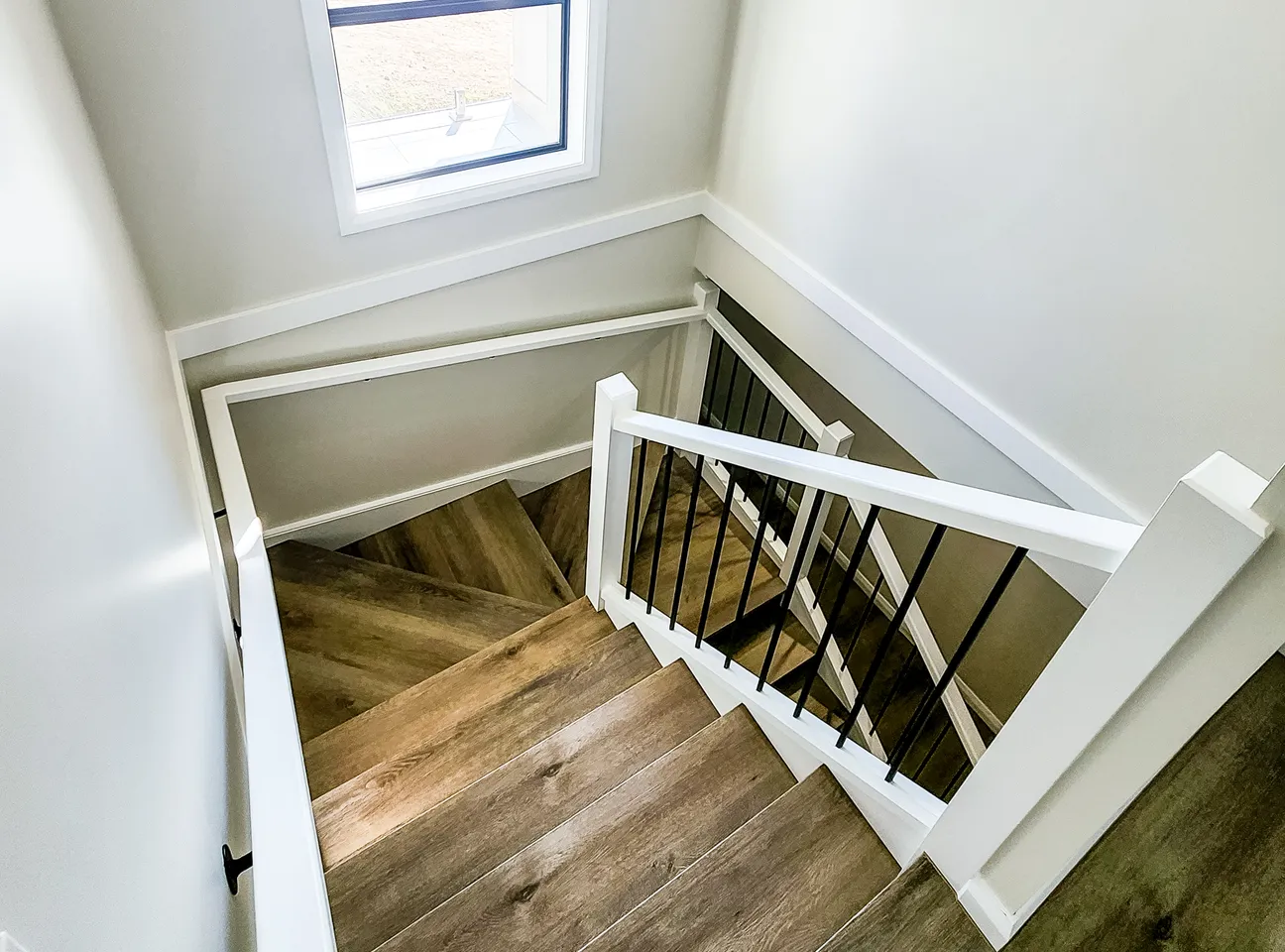 Timber staircase in a BuildTec acreage home