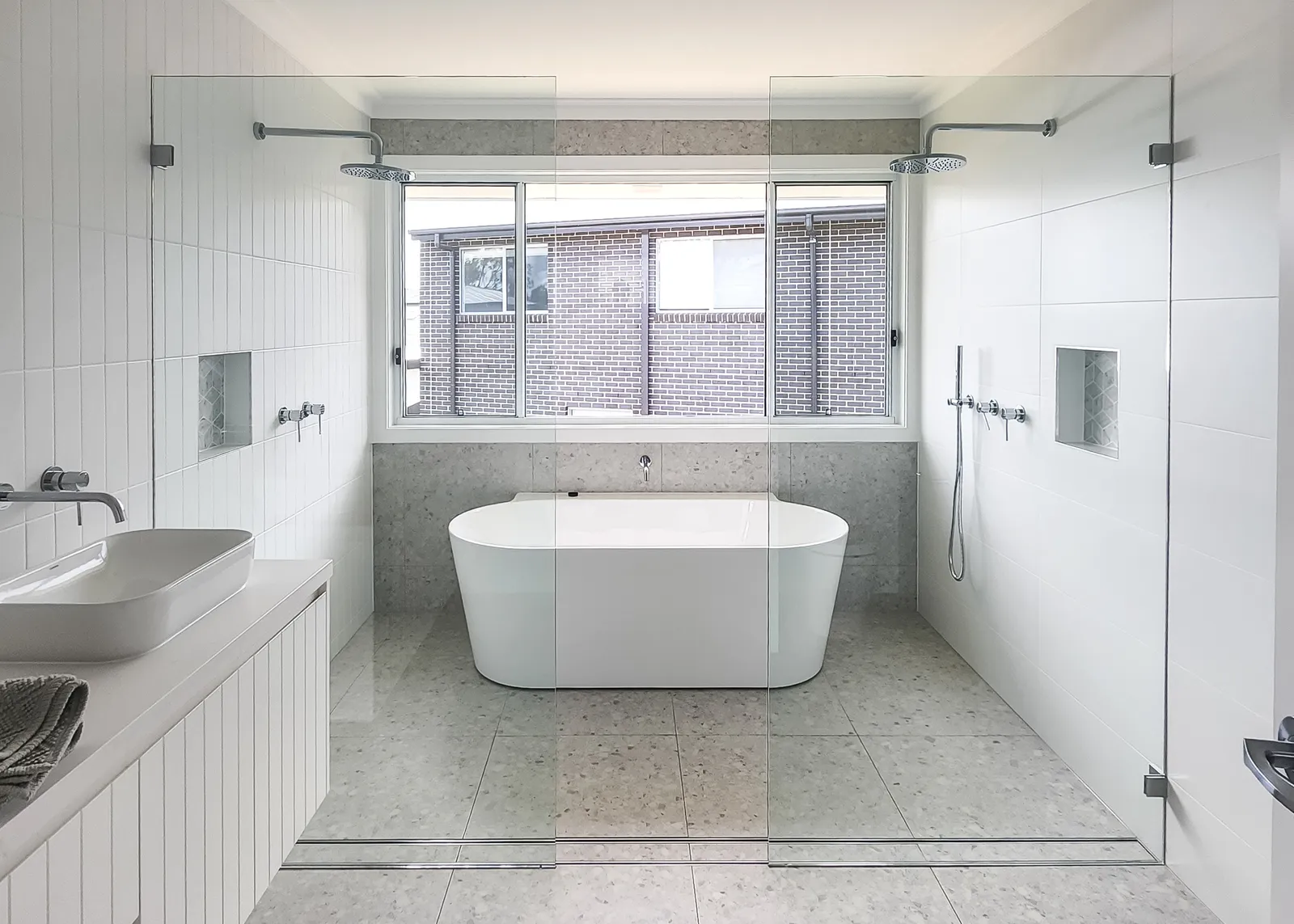 Custom home ensuite with freestanding bath and walk-in shower